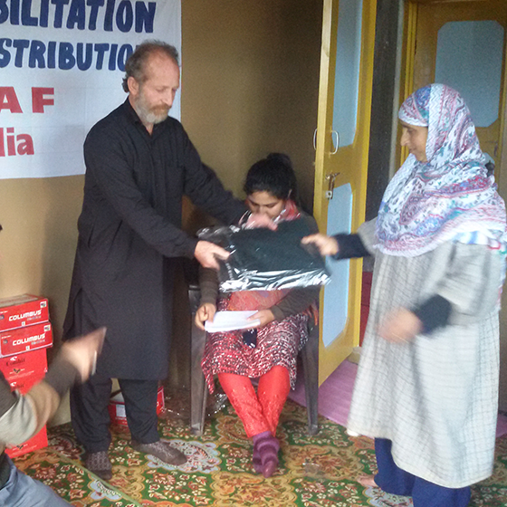 J&K Rehabilitation Programme — distributing relief items